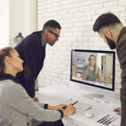 team members collaborating on a video call, symbolising trust and teamwork in a remote environment