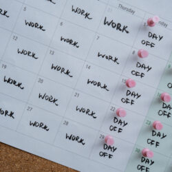 Calendar with four highlighted workdays and three consecutive days off, representing a four-day work week.